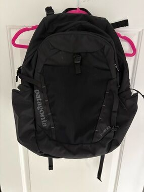 Patagonia Black Backpack with Pink Hanger Accent